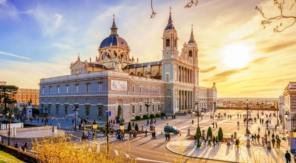 Almudena Cathedral beside the palace at sunset