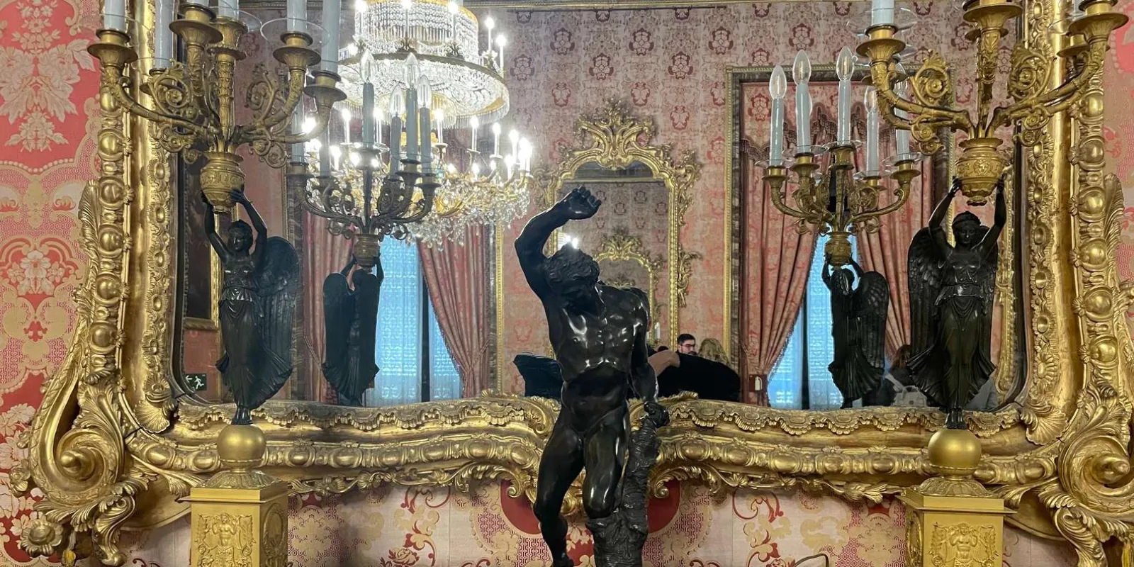 Decorated palace interior with gilded furnishings