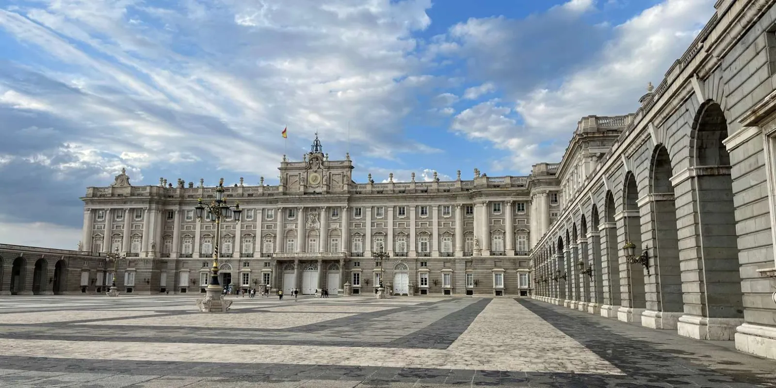 Palace forecourt under a blue sky
