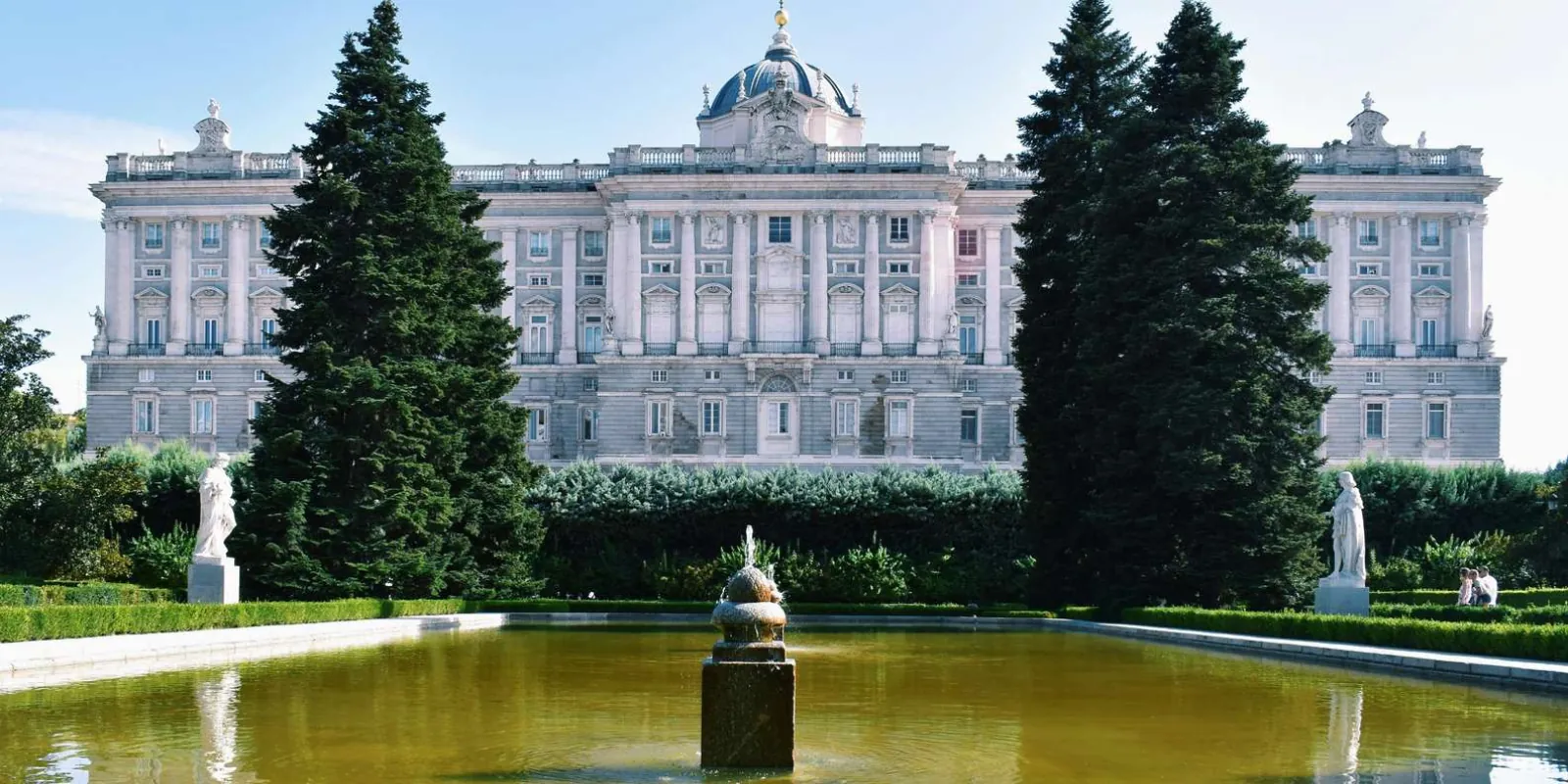 Palace façade beyond formal gardens