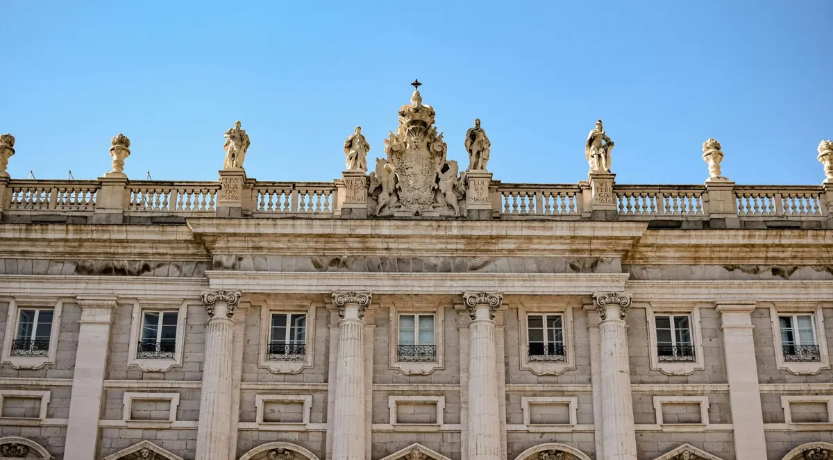 Stone figures along the Royal Palace roofline